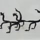 Paire de chenets de cheminée aux dragons en fer forgé