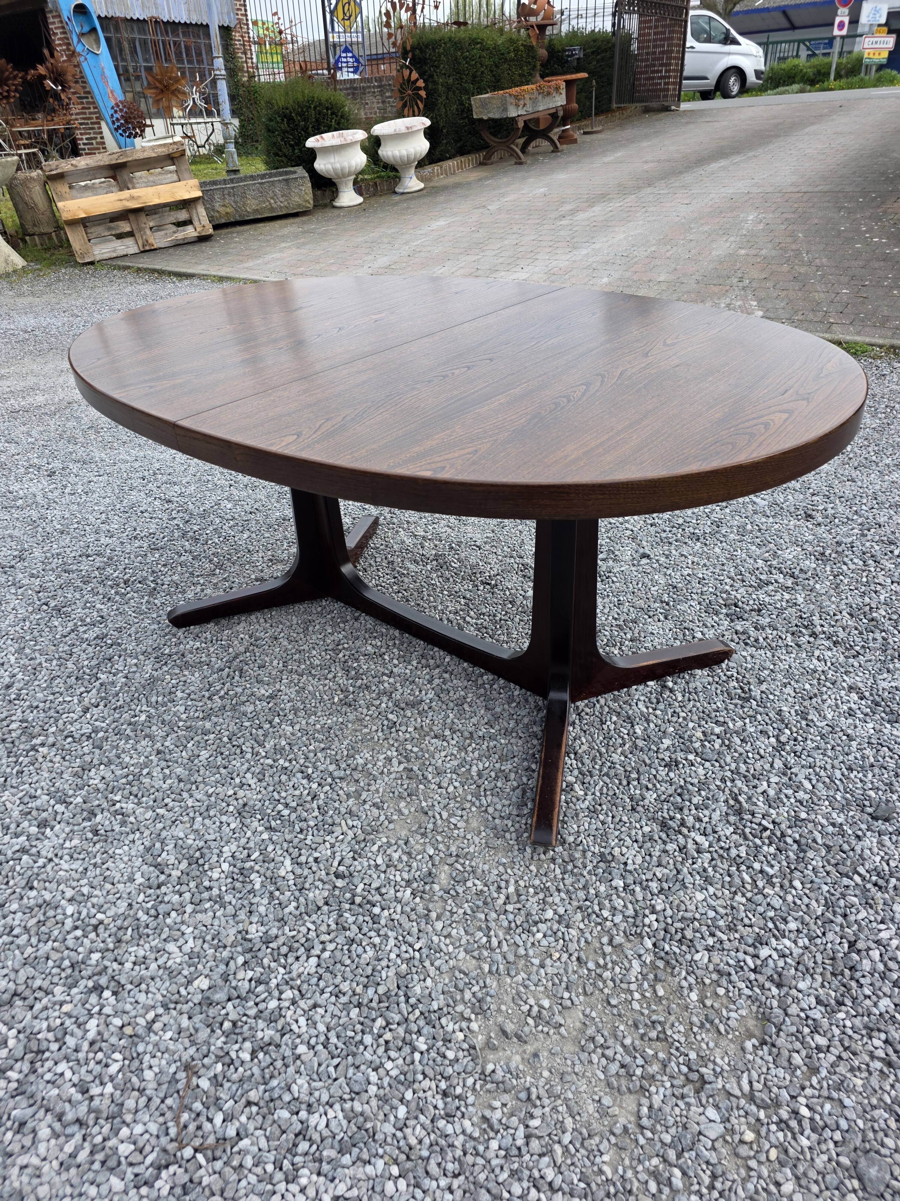 Extensible Baumann table in oak from the 1960s.