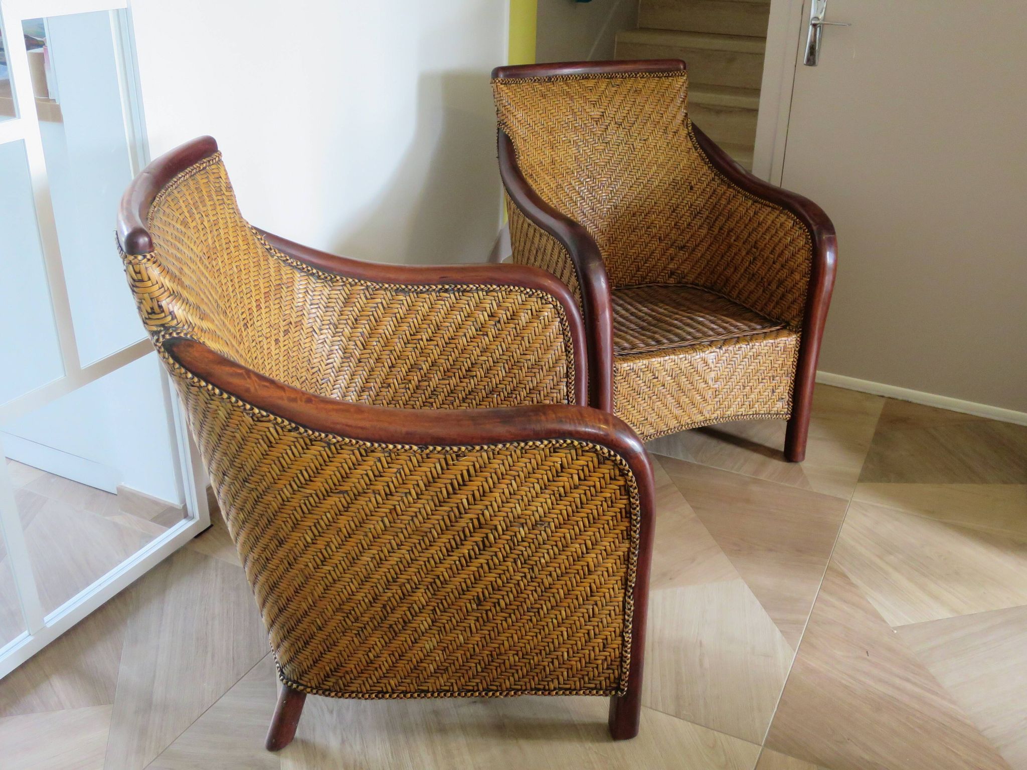Set of 2 armchairs in woven rattan and exotic wood, 1980s