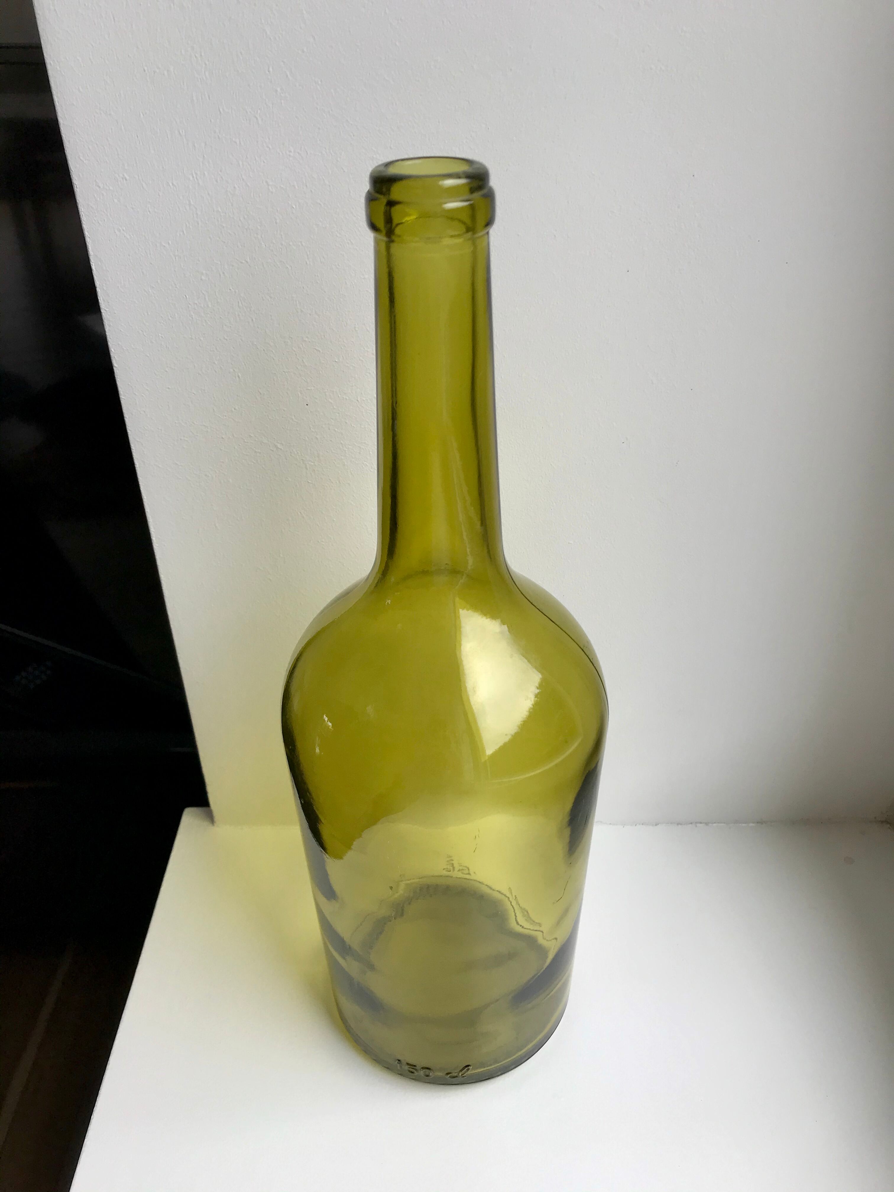 Old bottle in green glass 30s