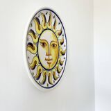 Decorative ceramic plate with sun face