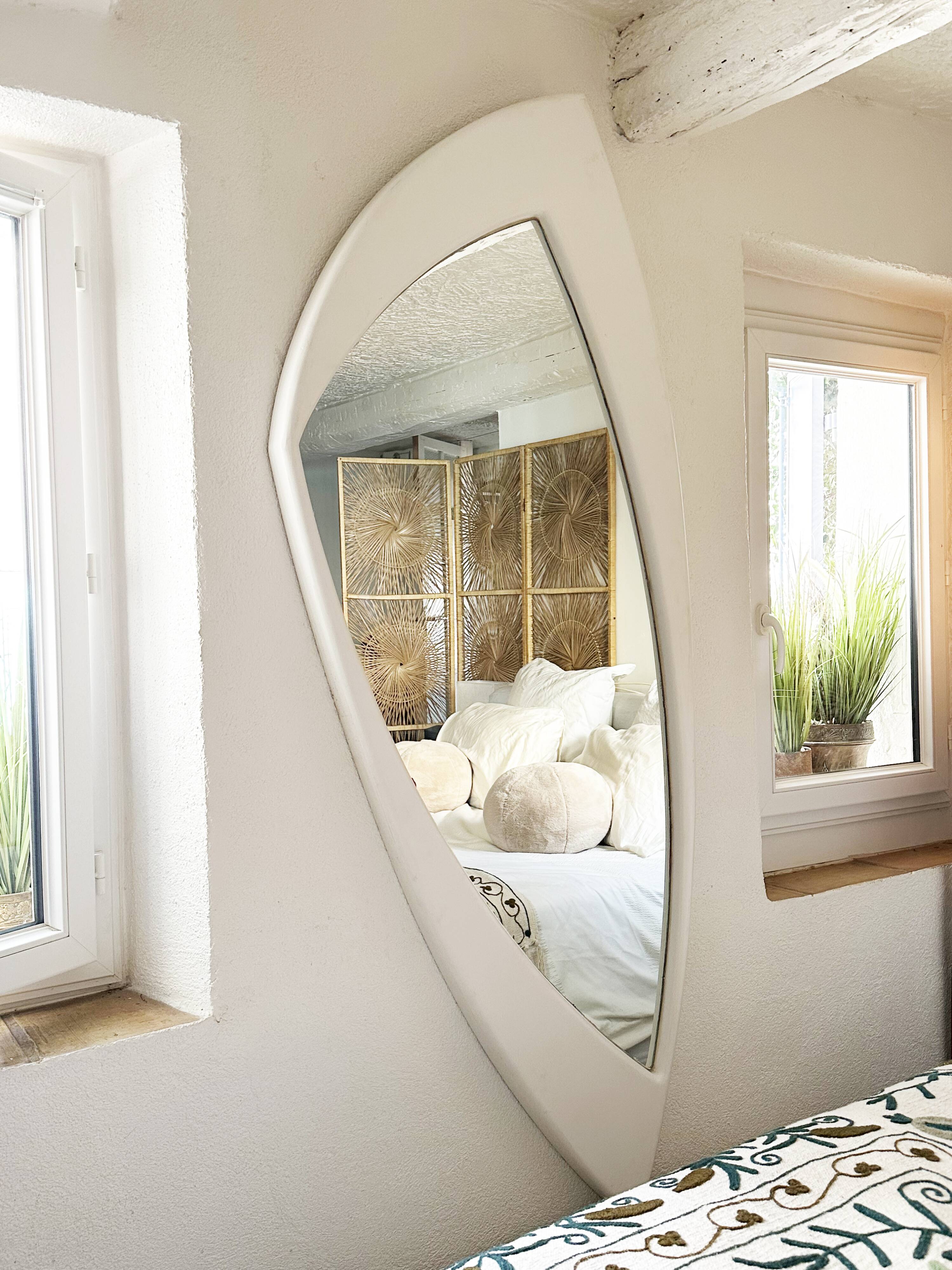 Dismantled Space Age XXL wall mirror in lacquered wood. France, 1970s.