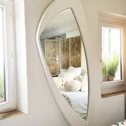 Dismantled Space Age XXL wall mirror in lacquered wood. France, 1970s.