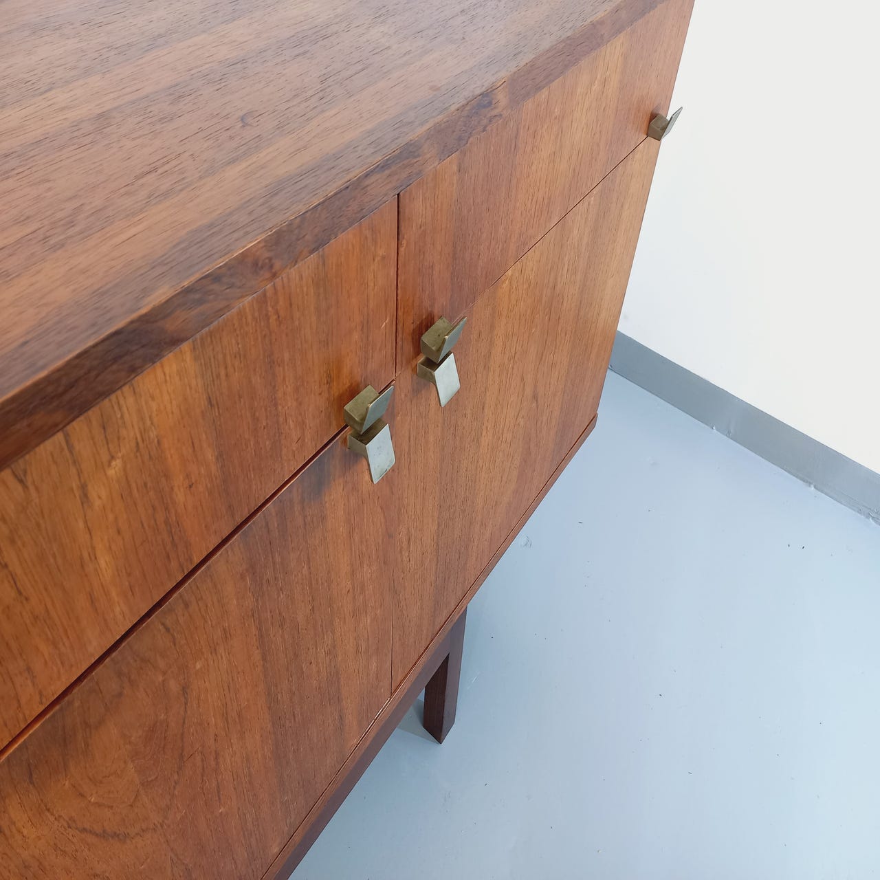 Vintage Scandinavian style row in rosewood and brass from the 60s