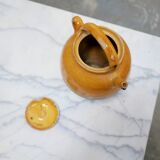 Old gargoulette pot in glazed terracotta