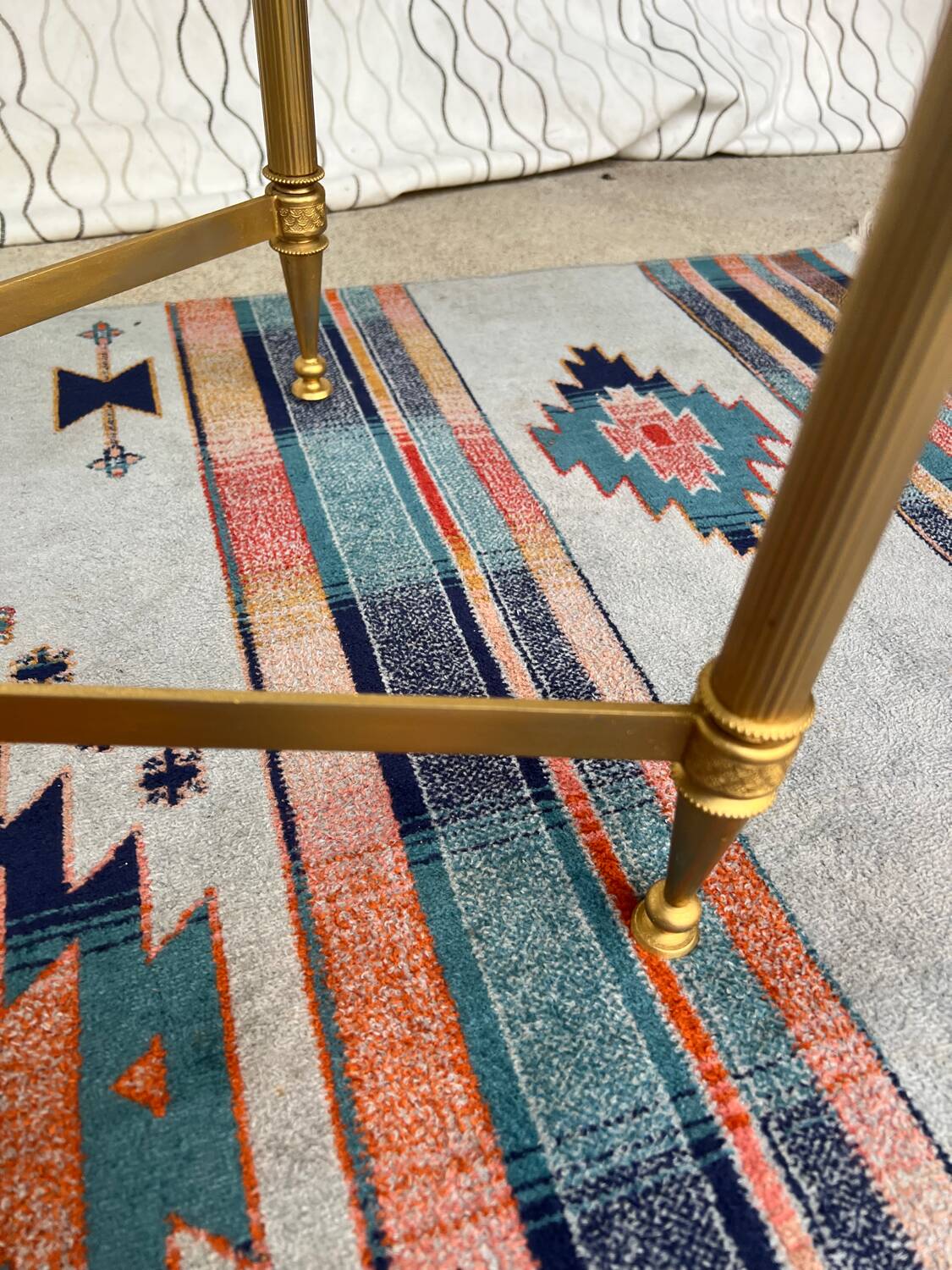 Vintage gold coffee table. Glass top.