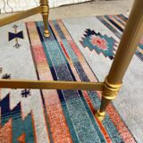Vintage gold coffee table. Glass top.