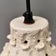 Two ceramic hanging lamps, in creamy white color, looking almost like coral