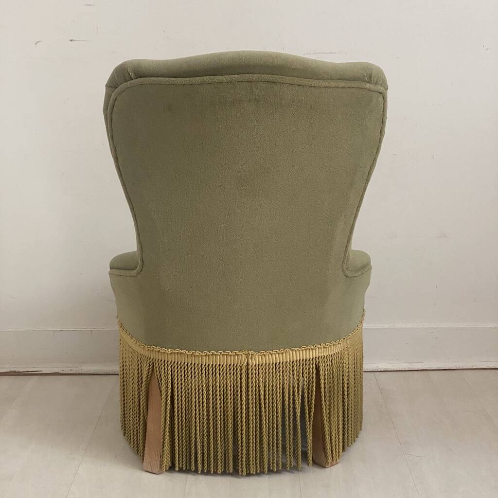 Small green velvet tub chair