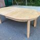 Table à manger scandinave ronde extensible décapée en chêne brut 1970