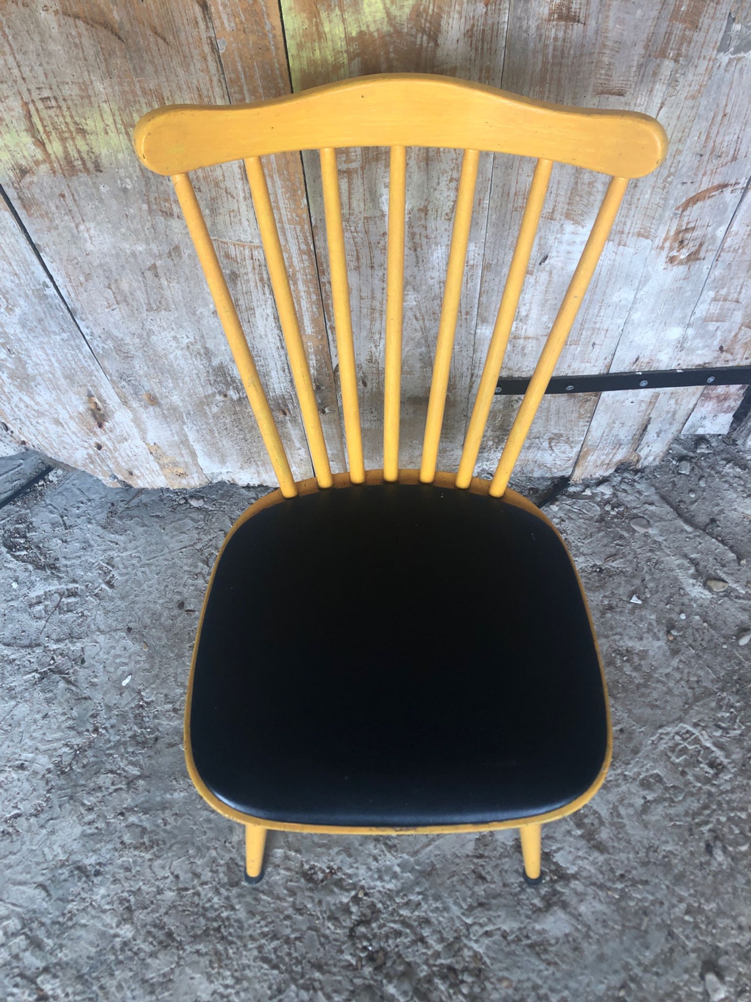 Baumann western style chair in yellow wood + vintage black skai seat