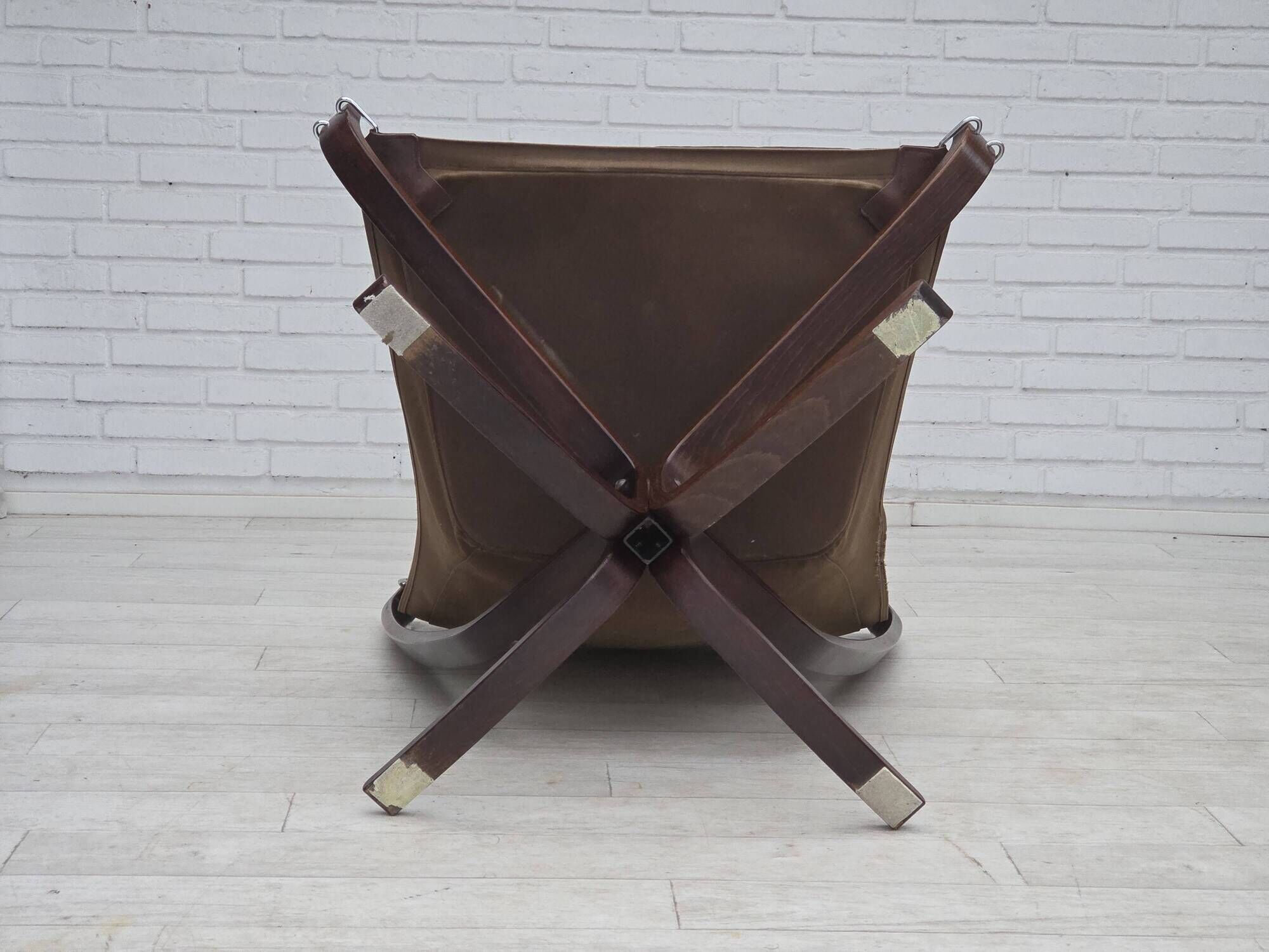 1970s, Norwegian design by Sigurd Ressel, chair "Falcon" with footstool.