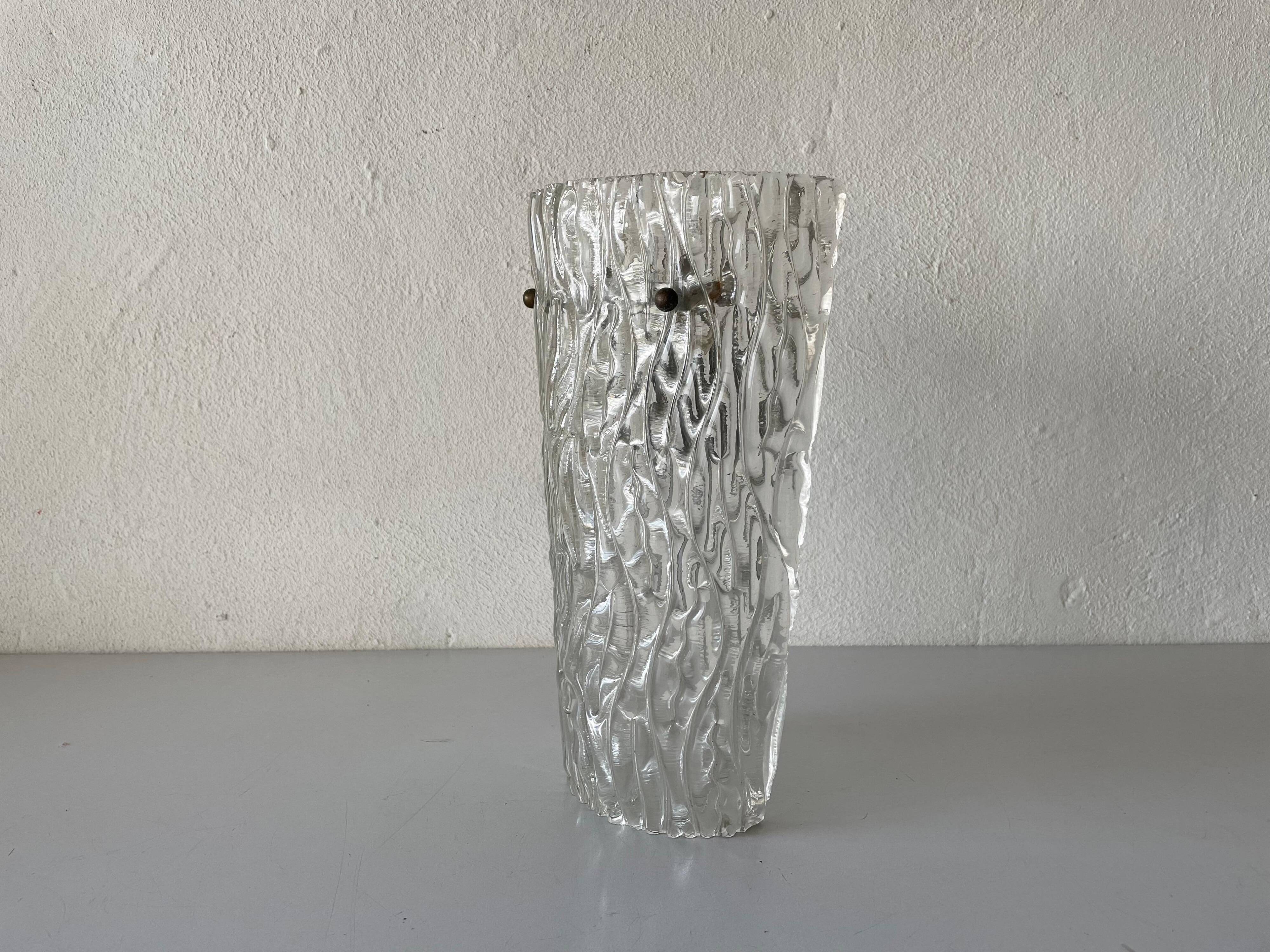Simple arch-shaped wall light in textured glass, 1950s, Germany.