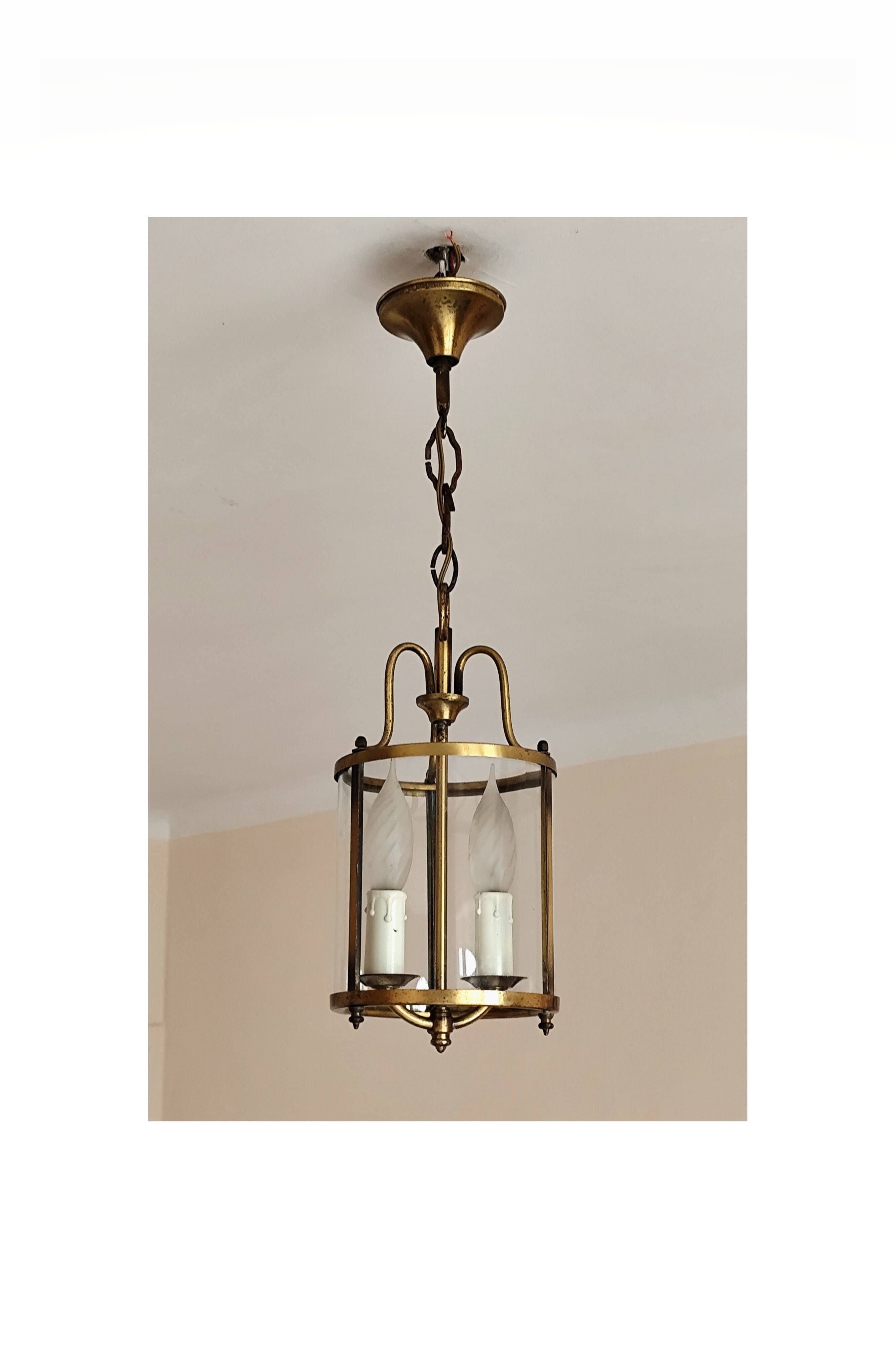 Cylindrical brass and glass lantern in Louis XVI style.