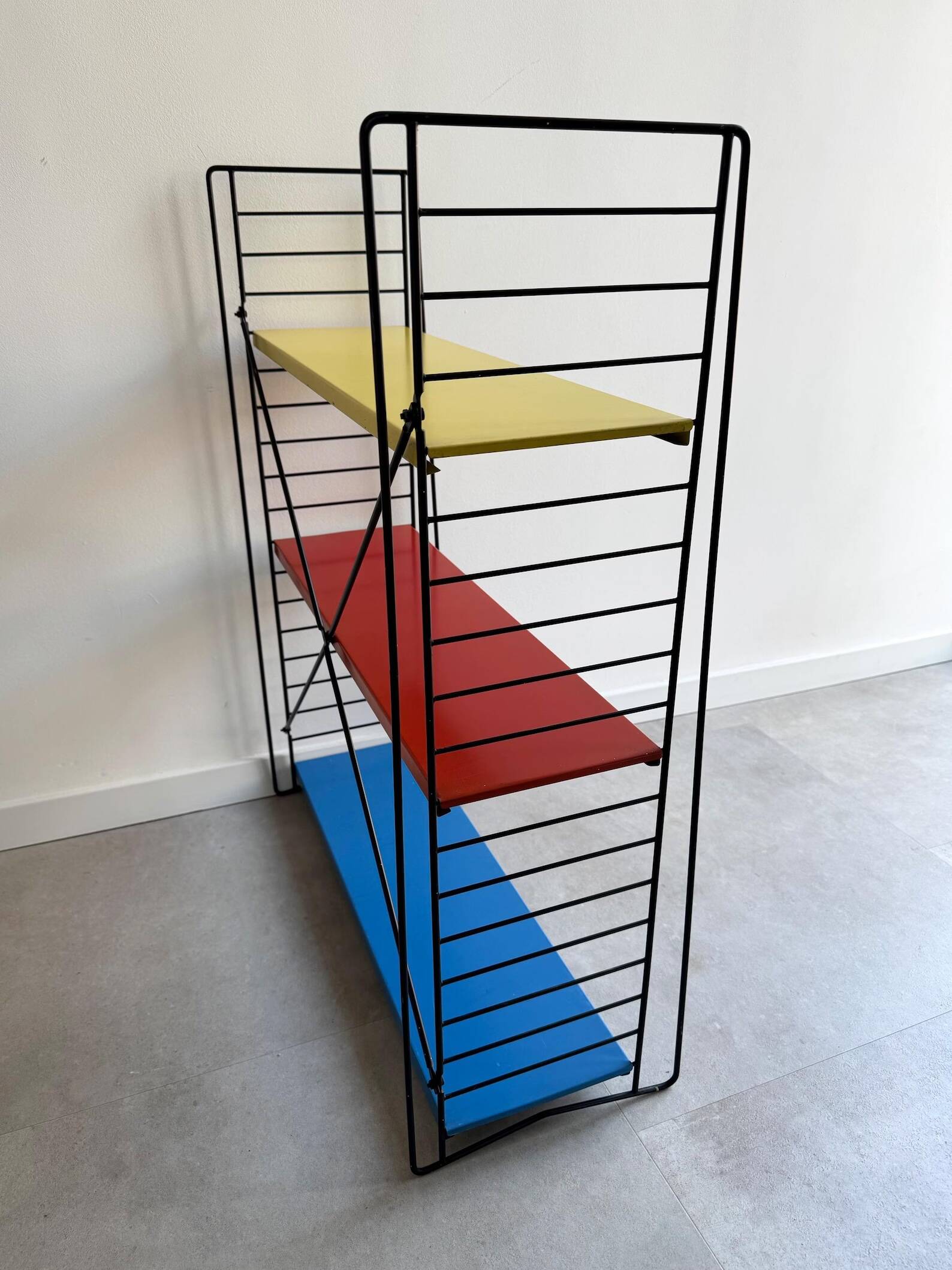 Early free standing Tomado bookshelves / shelving cabinet designed by D. De