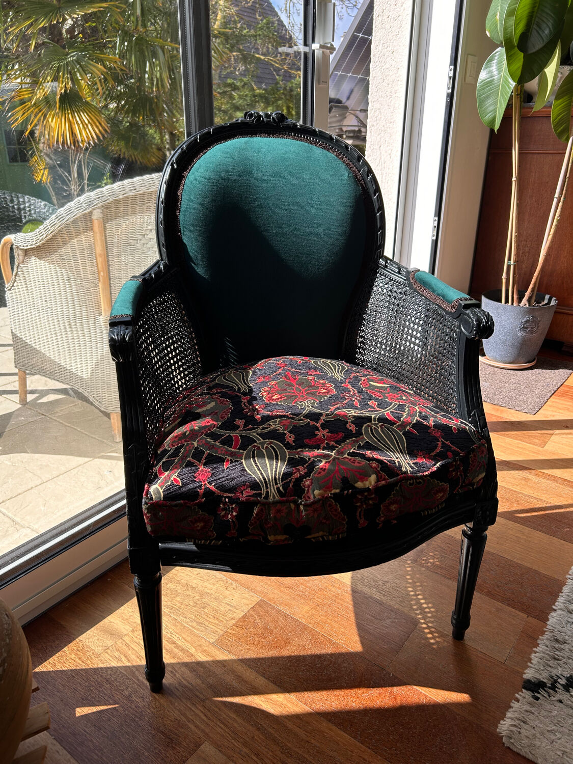 Louis XVI armchair with caning and dark green velvet