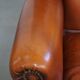 Fauteuil à oreilles en cuir de mouton