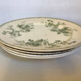 Four old earthenware plates