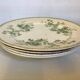 Four old earthenware plates