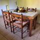 Dining table in chic country style and 4 chairs.