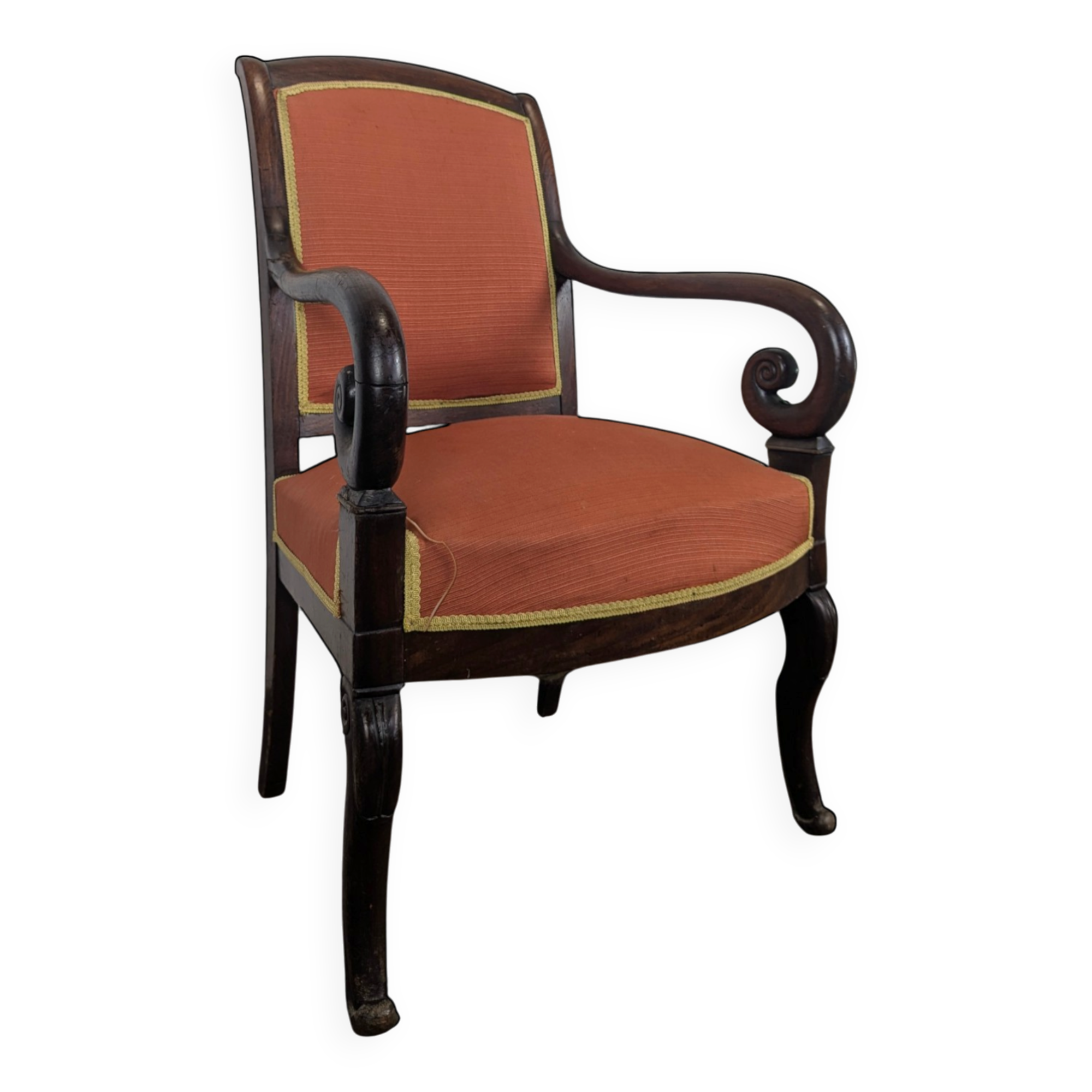Restoration armchair in mahogany with cross arms and orange fabric.