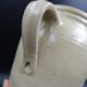 Grease pot with burgundy sandstone spout