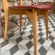 Chaise skaï rouge années 60