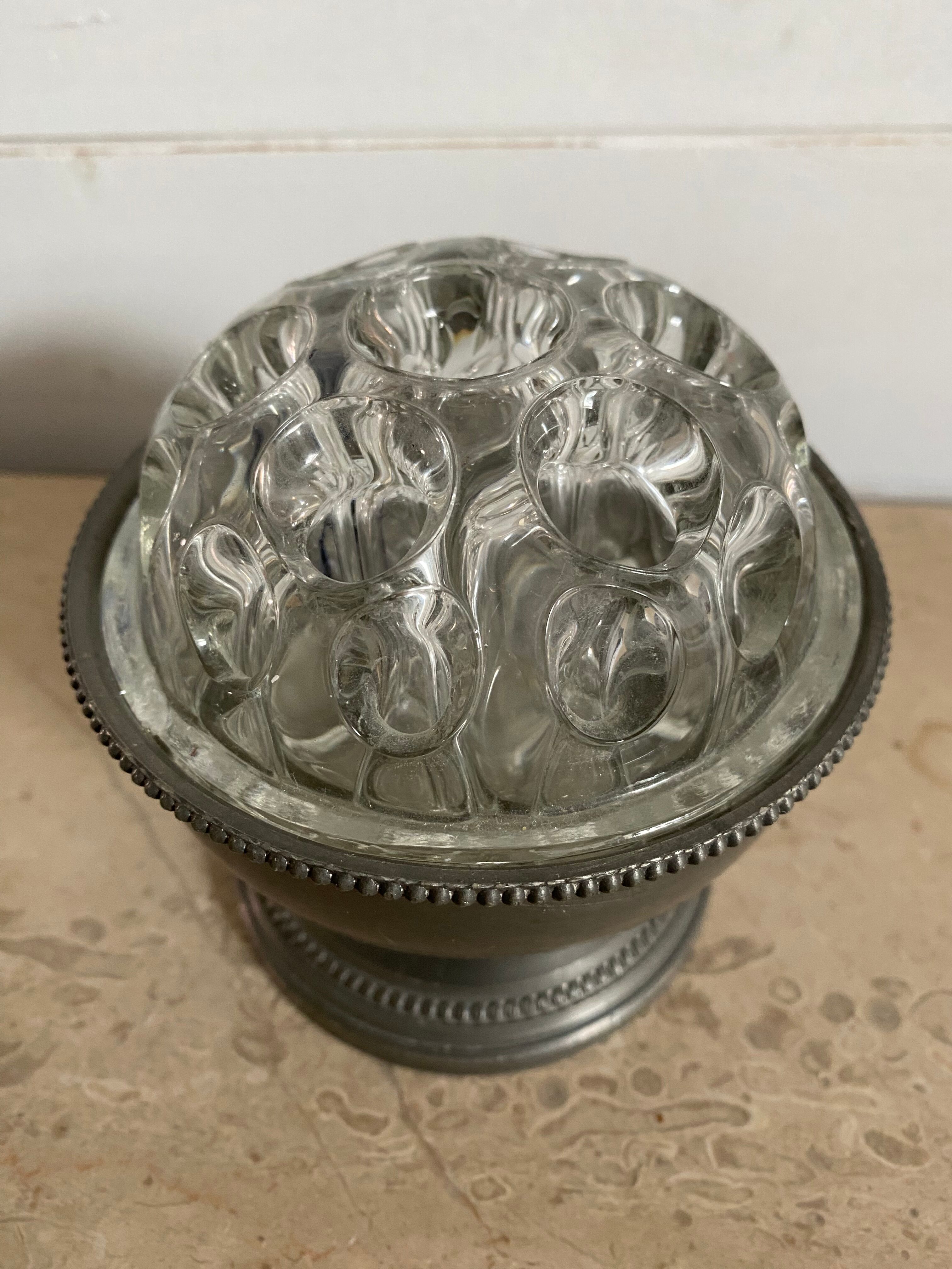 Old glass flower stick on pewter foot