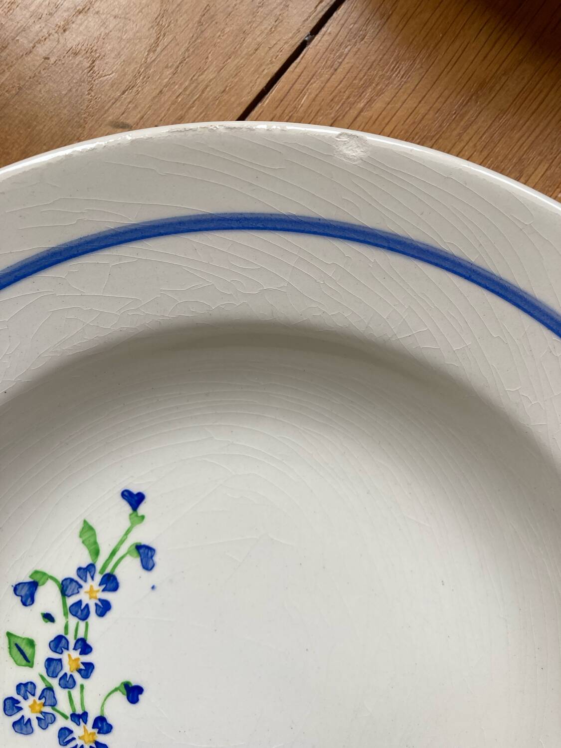 6 assiettes creuses Niderviller à décor de fleurs bleues