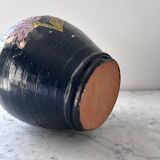 Black water jug with floral decoration