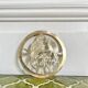 Small brass trivet with parrots or inseparable birds