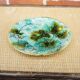 Old slipware plate: vine leaves