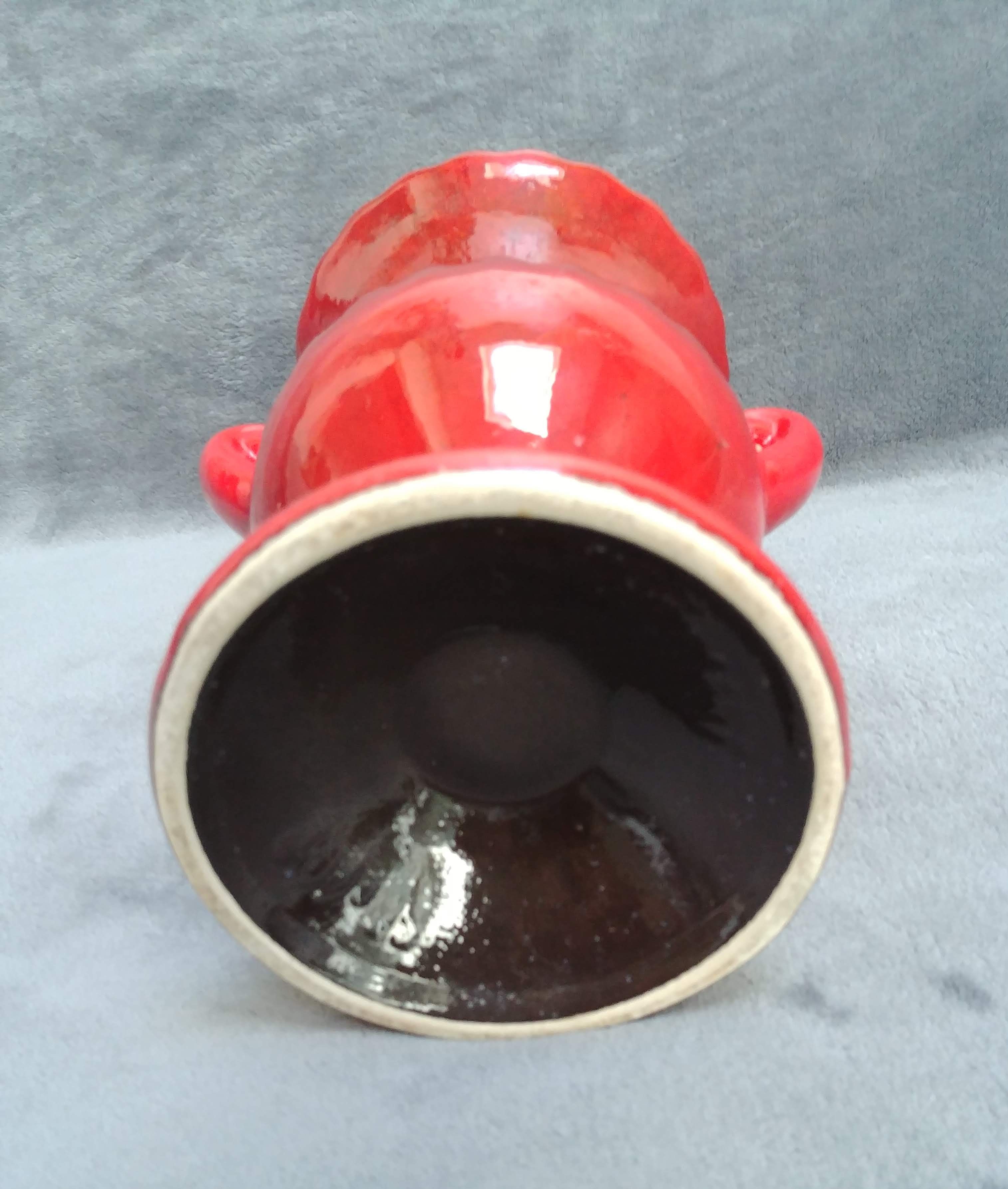 Very pretty red ceramic vase with black highlights with two handles