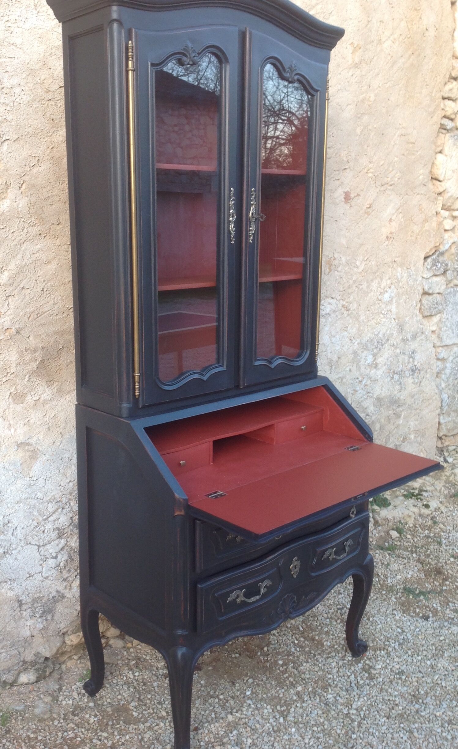 Louis XV style scriban bookcase in black and Basque red patinated cherry wood