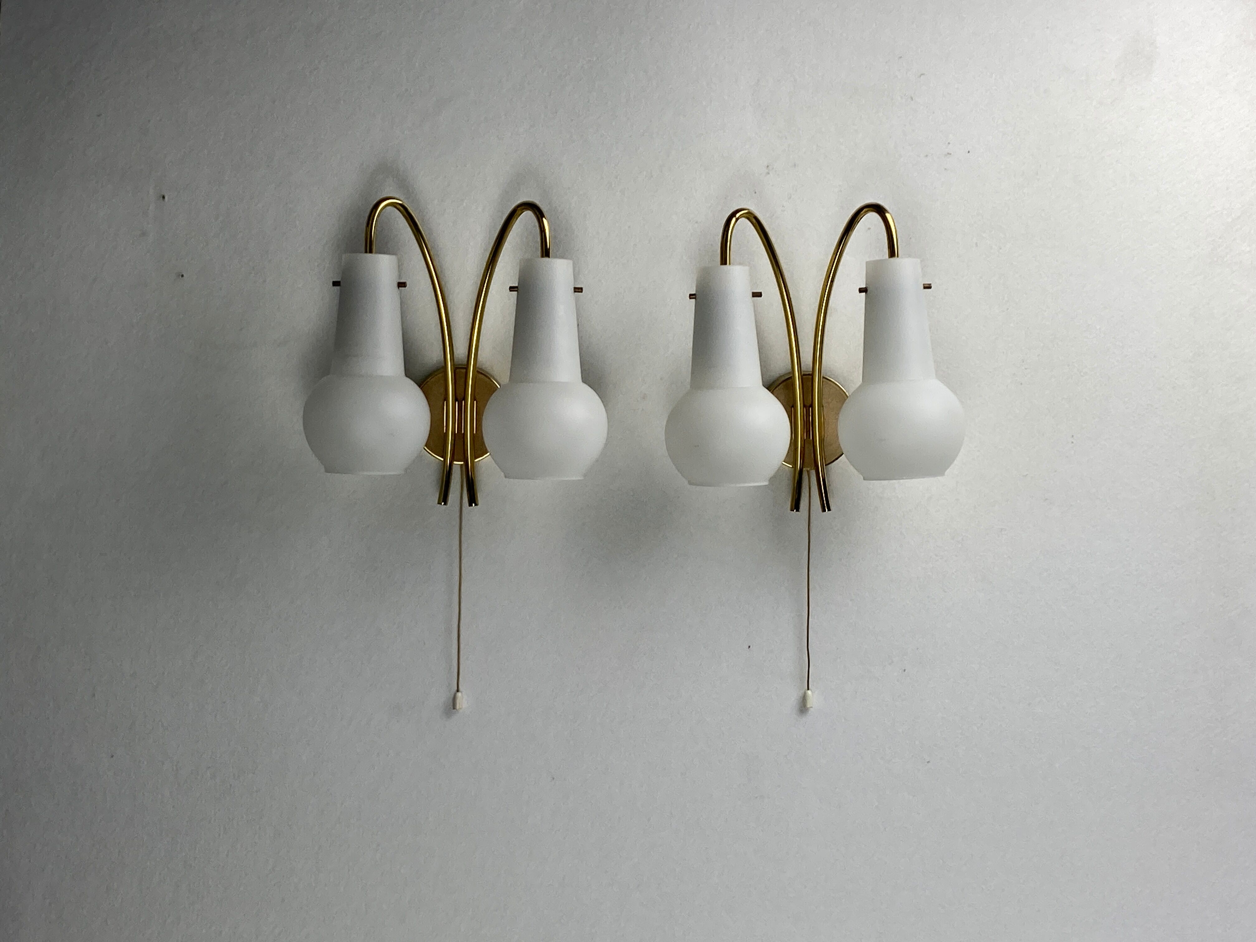 Pair brass and opaline wall sconces or bedside lamps, Austria 1950s