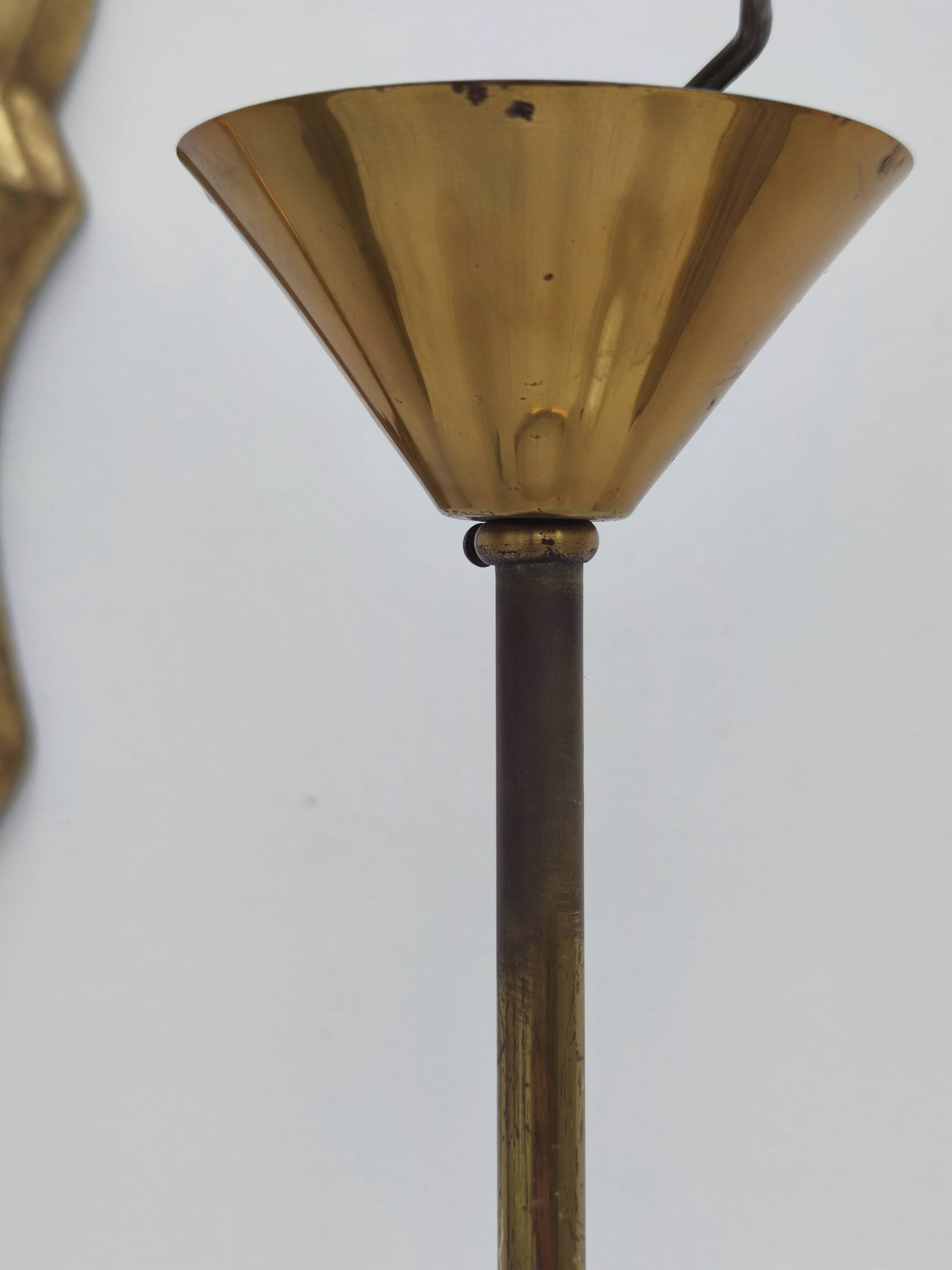 Brass chandelier and white opalines