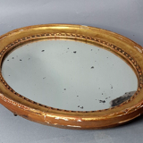 Oval mirror carved wood frame beaded gilded circa 1800 44x35cm SB