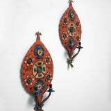 Pair of folk art sheet metal wall lamps, 1950s.