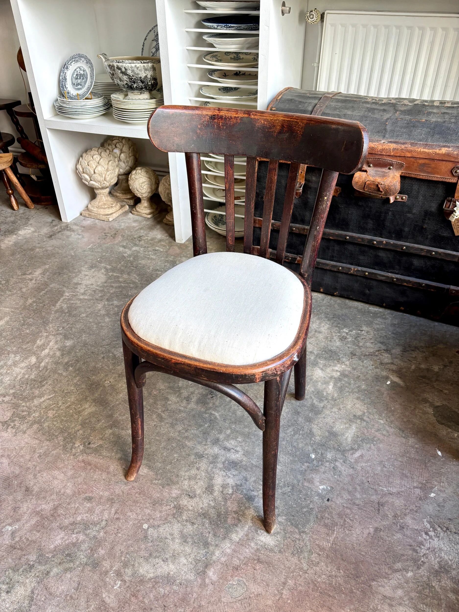 Bistro chair in bent beech and beige mixed fabric.