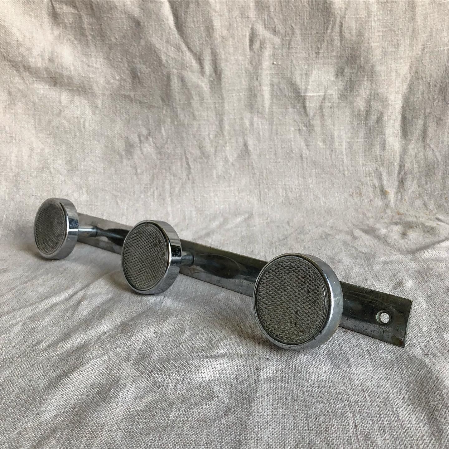 Metal wall coat rack