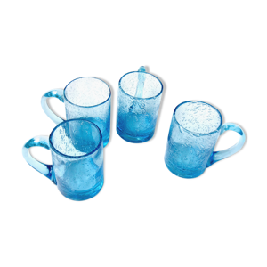 Quatre chopes en verre