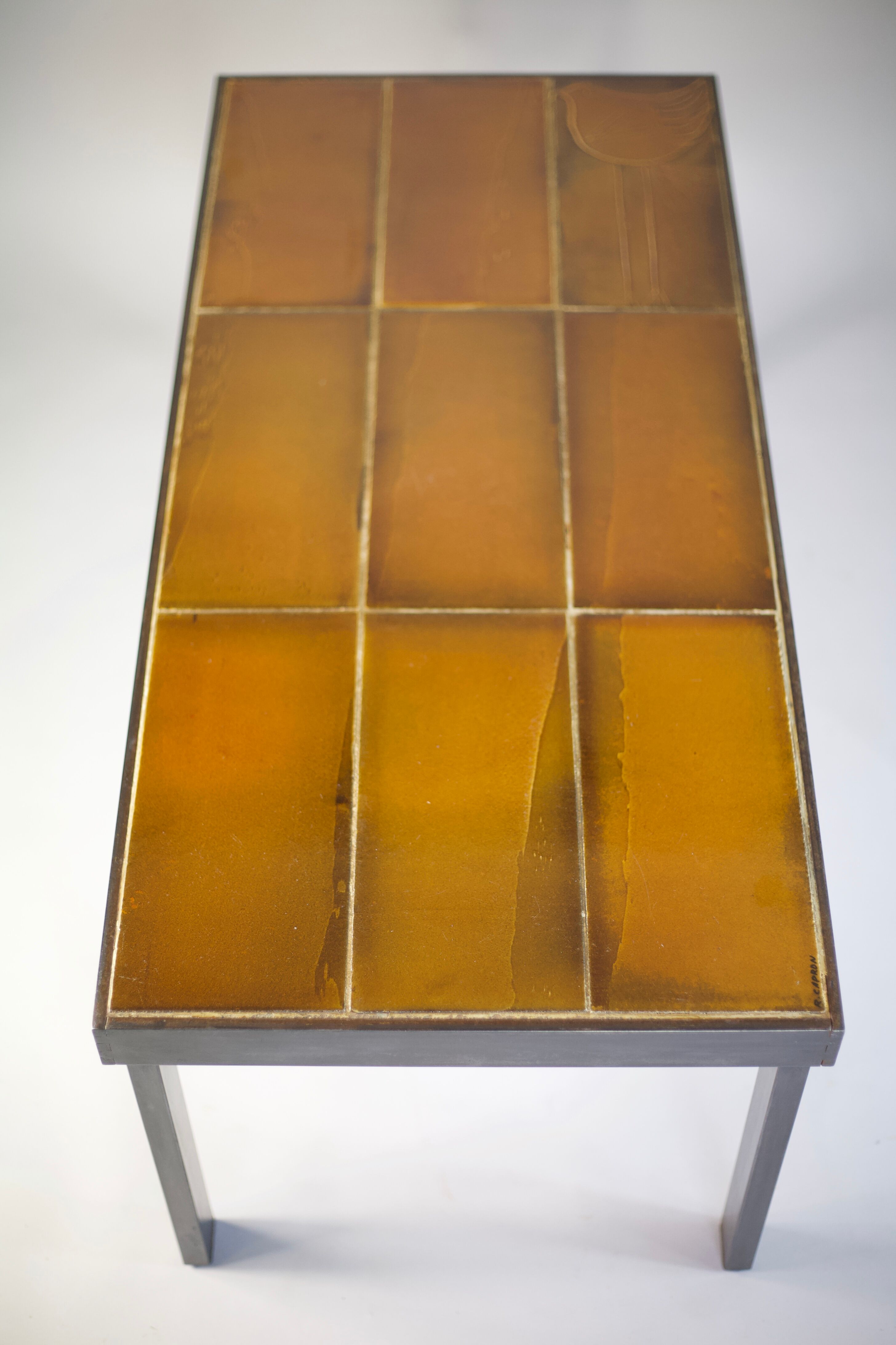 Coffee table signed Roger Capron, steel and ceramic, bird motif