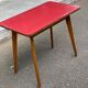 Scandinavian side table in solid wood and rosewood.