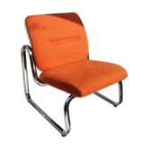 The 1970s orange armchair fabric and chrome metal