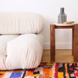 End table in travertine and wood
