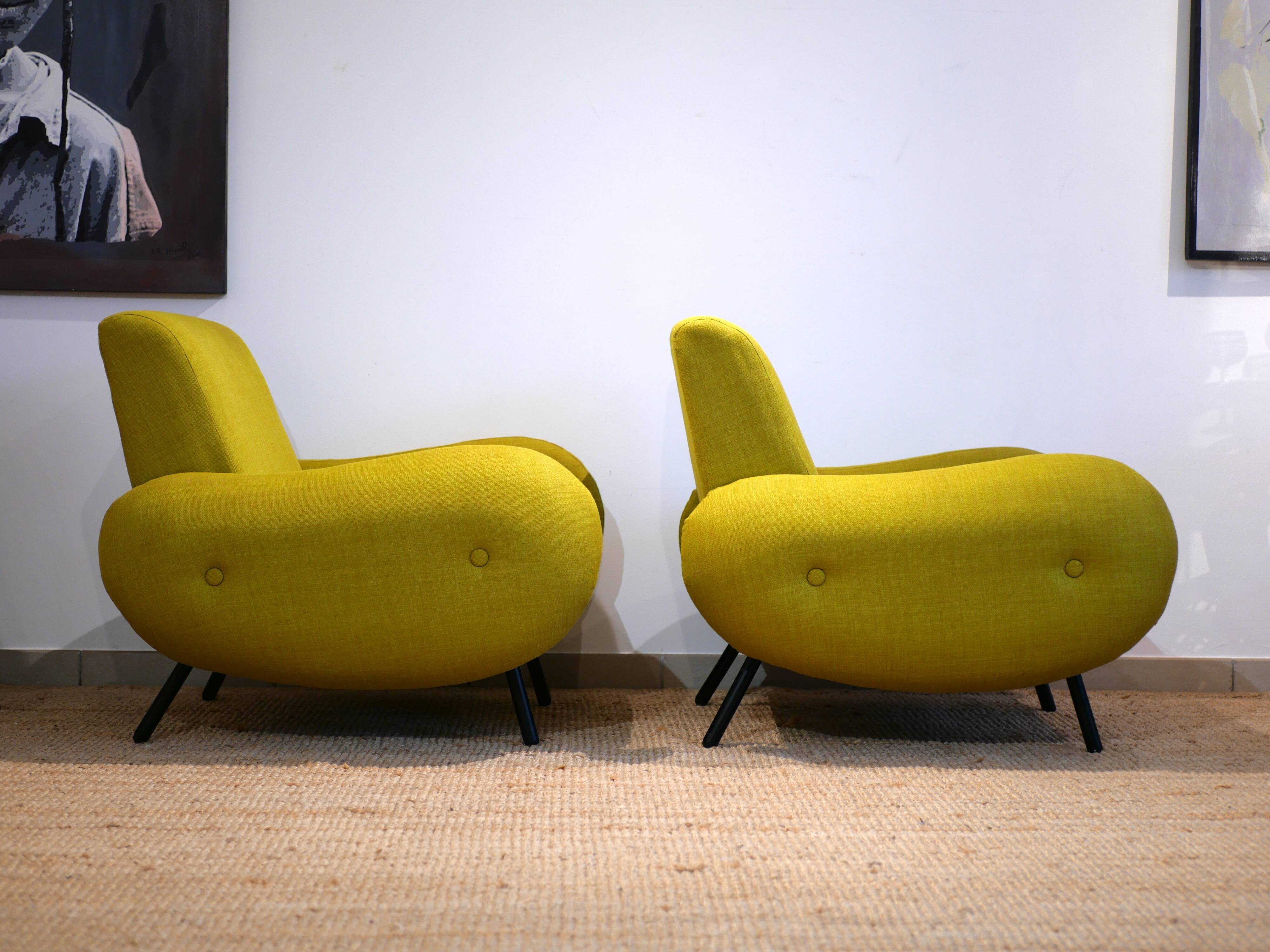 Pair of low armchairs in 60s–70s style