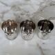 Set of 3 small silver 970 sterling cups with enamelled flags from the 20th century.