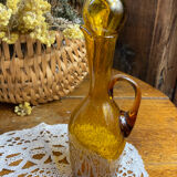 Blown glass oil dispenser with bubbles