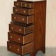 Pair of vintage military campaign high chests of drawers with leather tops.