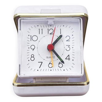 Small white travel alarm clock Germany 1990s.